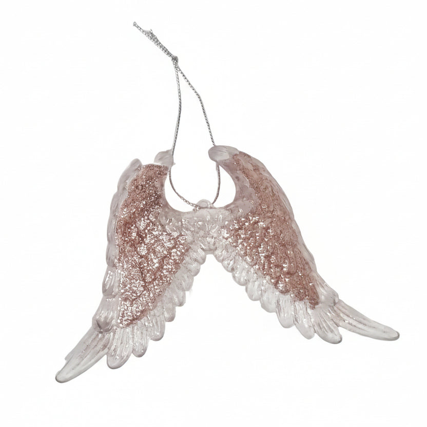 A pair of angel wings hanging ornament in a glittery rose gold and clear plastic, complete with a silver hanging string.