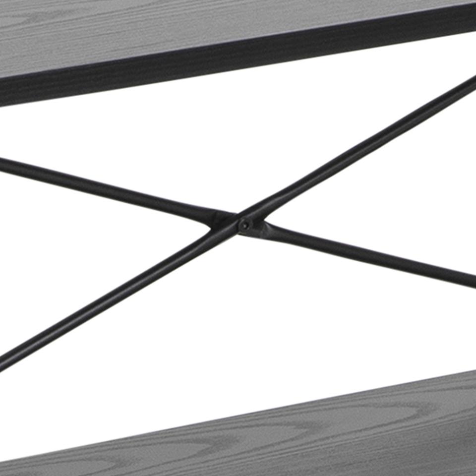Close-up of a metal table base with wooden top on a white background