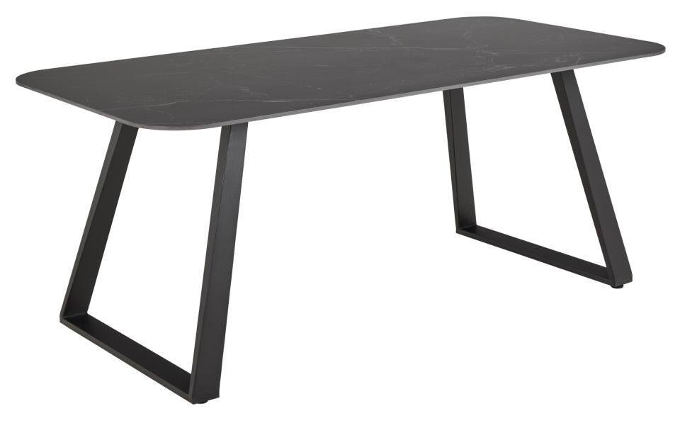Black dining table with a modern design on a white background