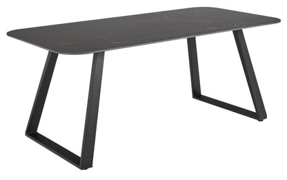 Black dining table with a modern design on a white background