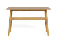 Load image into Gallery viewer, A light natural wood writing desk with a rectangular top, angled legs, and a horizontal support beam, shown against a plain white background.
