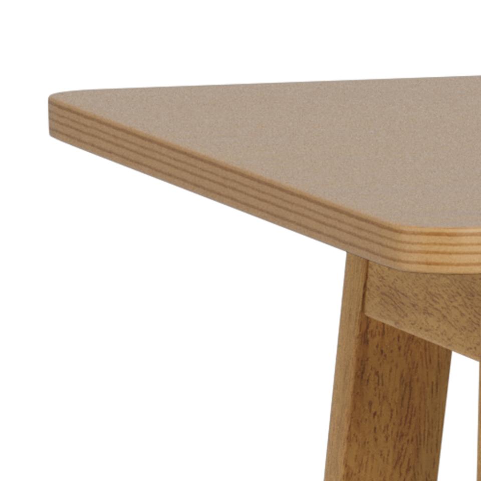 Close-up of a wooden table with a white background