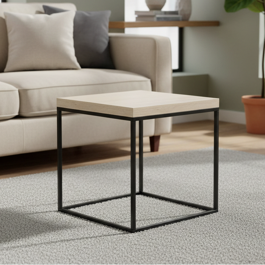 A square coffee table with a travertine stone effect top and a black metal base.