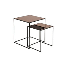 Load image into Gallery viewer, A pair of nested square nesting tables with black metal frames and translucent smoky brown glass tops, shown on a plain white background.
