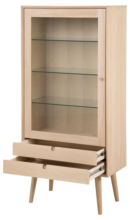 Beige display cabinet with glass shelves and a drawer on a white background