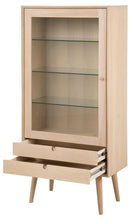 Load image into Gallery viewer, Beige display cabinet with glass shelves and a drawer on a white background
