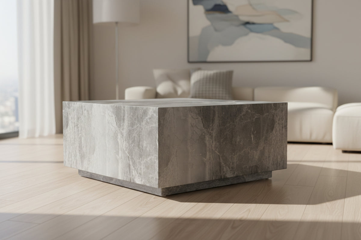 Gray marble cube on a white background
