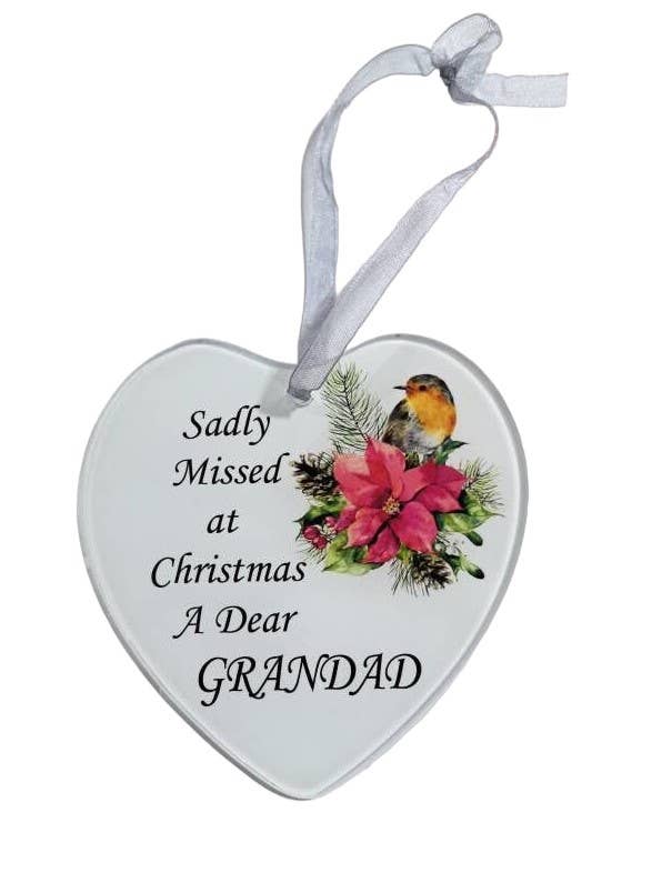 a glass hear with a memorial message on the front and a robin with a ribbon for hanging, reads 'sadly missed at Christmas a dear Grandad'