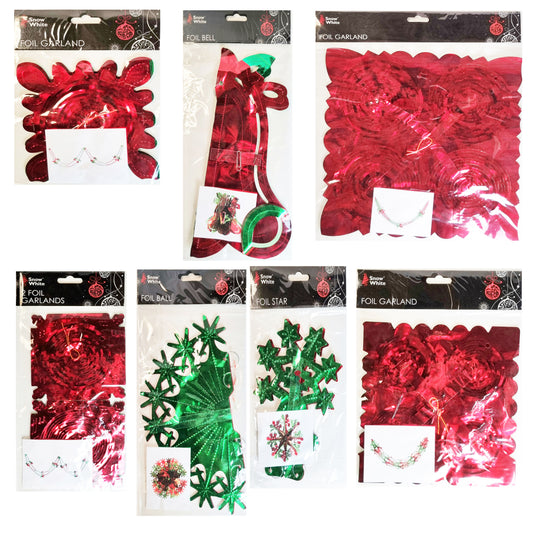 Assorted festive foil decorations in red and green packaging on a white background