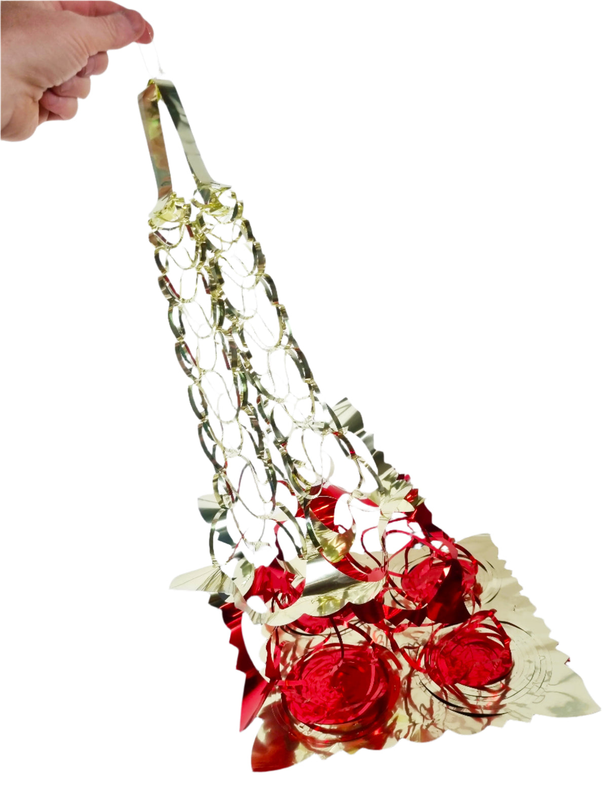 A hand holds a decorative hanging ornament featuring red roses, gold metallic chains, and gold leaf accents against a plain white background.