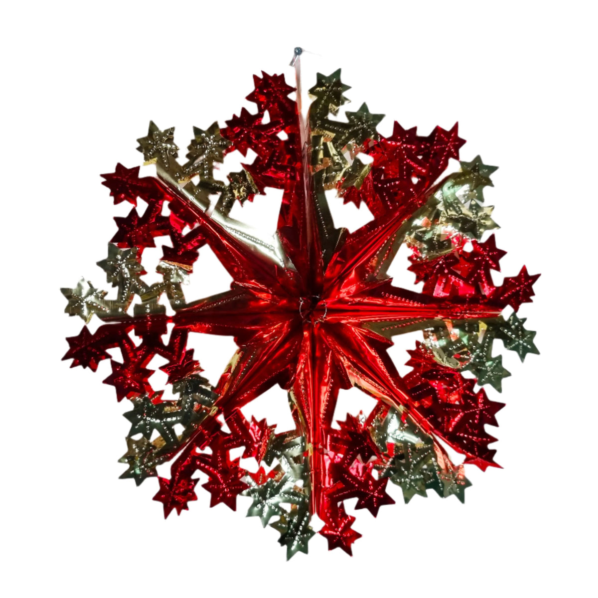 A festive red and gold snowflake Christmas ornament with layered star details, isolated on a white background.
