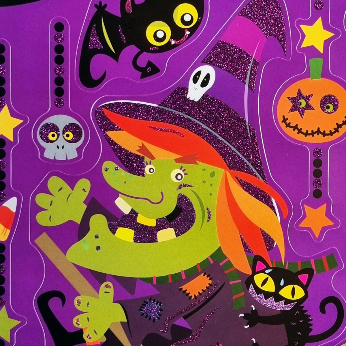 Halloween-themed sticker sheet featuring a green lizard-like witch character in a purple pointed hat, a black cat, a bat, a jack-o'-lantern, skulls, stars, and candy on a purple background.