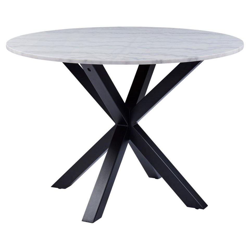A round white marble dining table with a black metal base.
