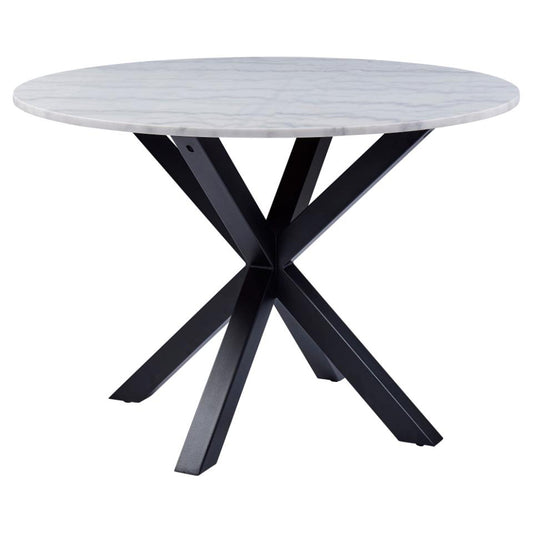 A round white marble dining table with a black metal base.