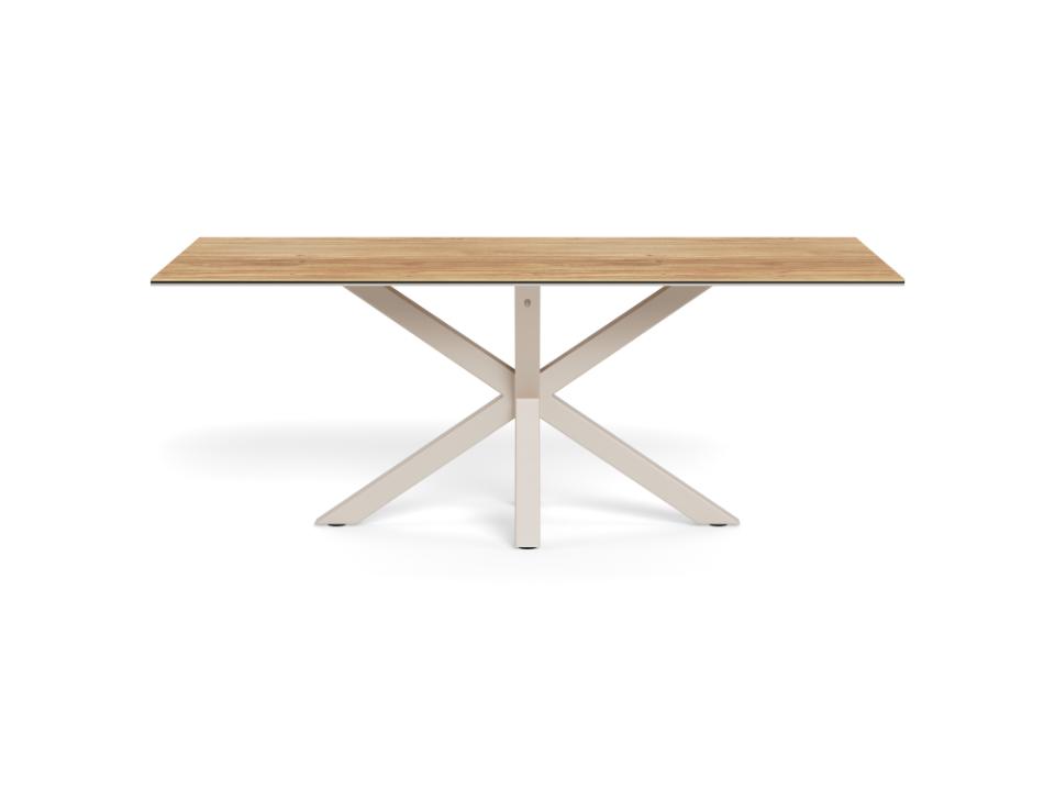 A rectangular dining table with a light oak wood top and a white painted metal X-shaped base, shown on a solid white background.