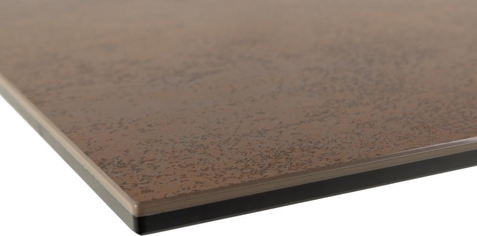Close-up of a brown ceramic table with a speckled pattern