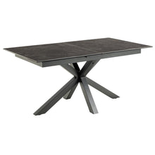 Load image into Gallery viewer, A modern rectangular dining table with a black ceramic top and a matching black X-shaped metal base, shown on a plain white background.
