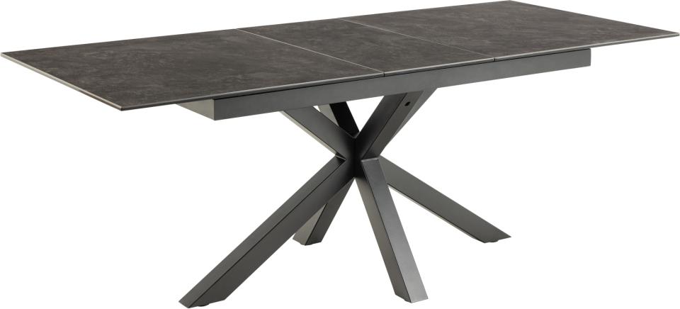 black ceramic extending dining table with a white background
