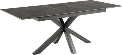 black ceramic extending dining table with a white background