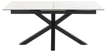 Load image into Gallery viewer, A modern rectangular dining table with a white marble-look top and a black metal X-shaped pedestal base, shown on a plain white background.
