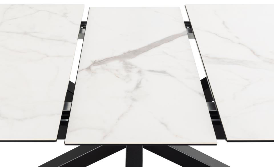 Close-up of a marble-patterned surface with a black metal frame.