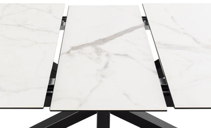 Close-up of a marble-patterned surface with a black metal frame.