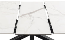 Load image into Gallery viewer, Close-up of a marble-patterned surface with a black metal frame.
