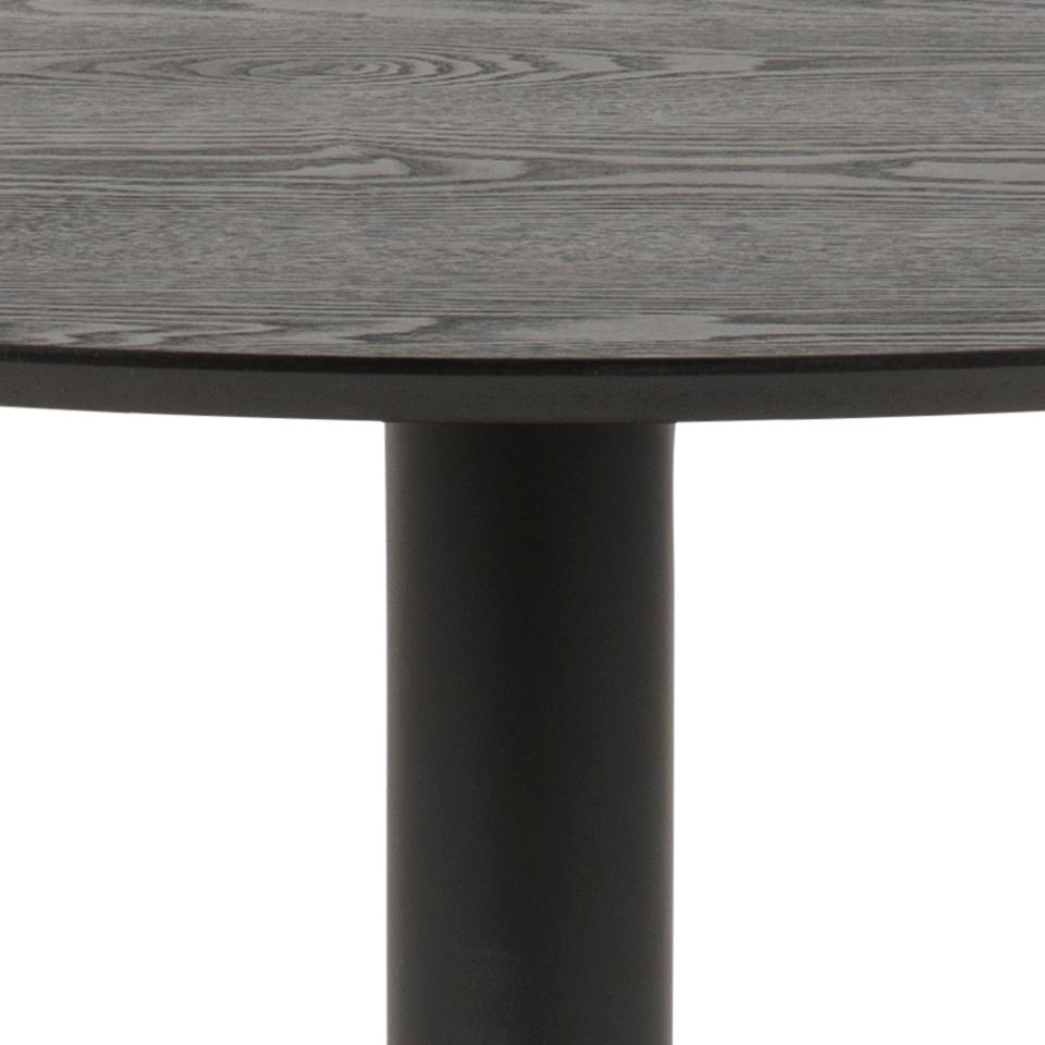 Close-up of a table with a dark gray wooden top and black cylindrical leg on a white background