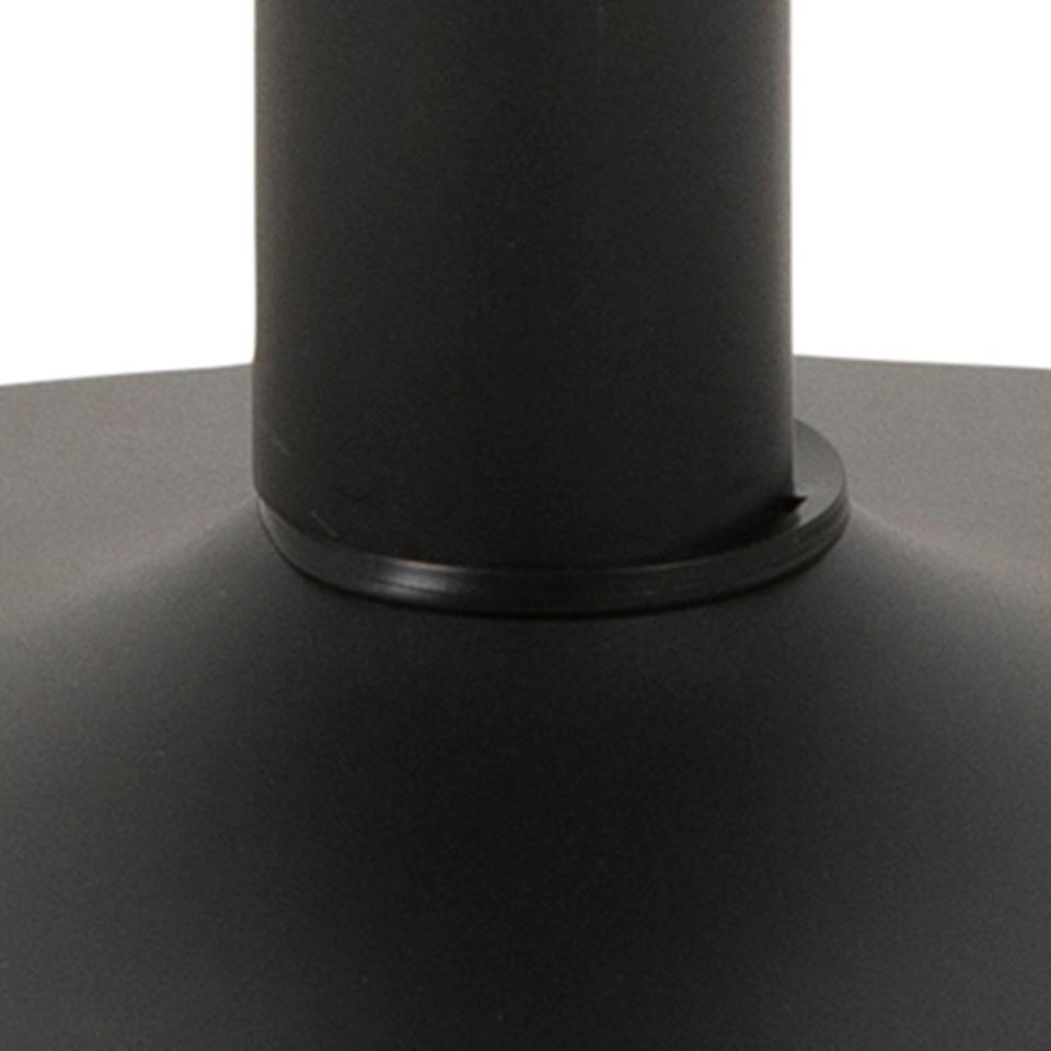 Close-up of a black cylindrical object on a white background