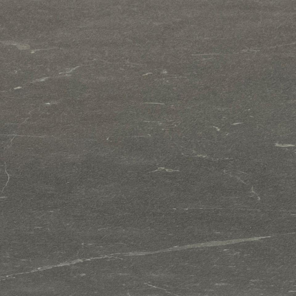 Dark gray stone or concrete surface texture with subtle white veining and a speckled finish.