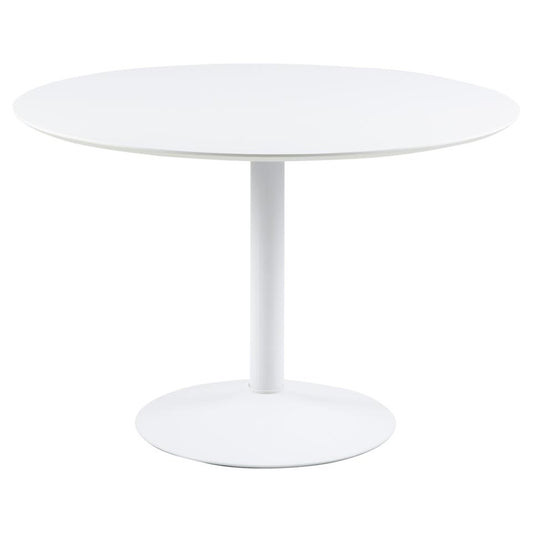 A round white dining table with a single pedestal metal base.