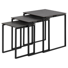 Load image into Gallery viewer, Set of three black nesting tables on a white background
