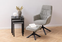 Load image into Gallery viewer, Gray armchair with ottoman and side table against a white wall
