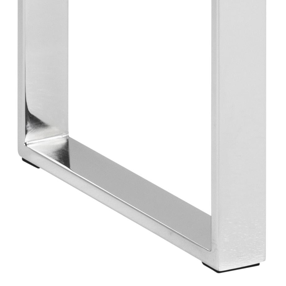 Close-up of a metallic corner bracket on a white background