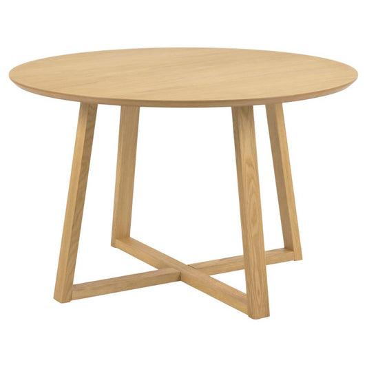 Round oak dining table with a minimalistic cross wooden base.