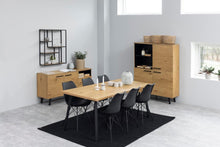 Load image into Gallery viewer, Modern dining room with wooden table and chairs in a minimalistic setting
