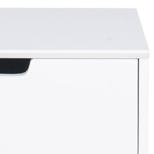 Load image into Gallery viewer, Close-up of a white desk surface with a black chair leg.
