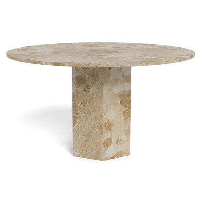 A round dining table made of beige travertine stone, featuring a natural stone top and a matching hexagonal pedestal base, shown on a white background.