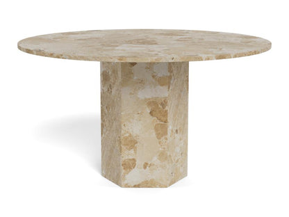 Round stone dining table on a white background