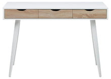 Load image into Gallery viewer, A modern writing desk with a white top and legs, featuring three drawers with light oak wood fronts and black handles, shown against a plain white background.
