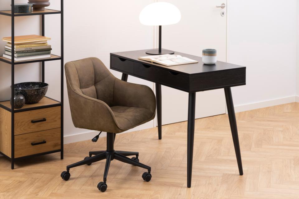 Modern office setup with a desk, chair, and shelves.