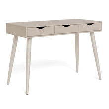 Load image into Gallery viewer, A mid-century modern writing desk with a light beige wood finish, featuring two drawers with curved black pulls and four tapered legs, shown on a white background.
