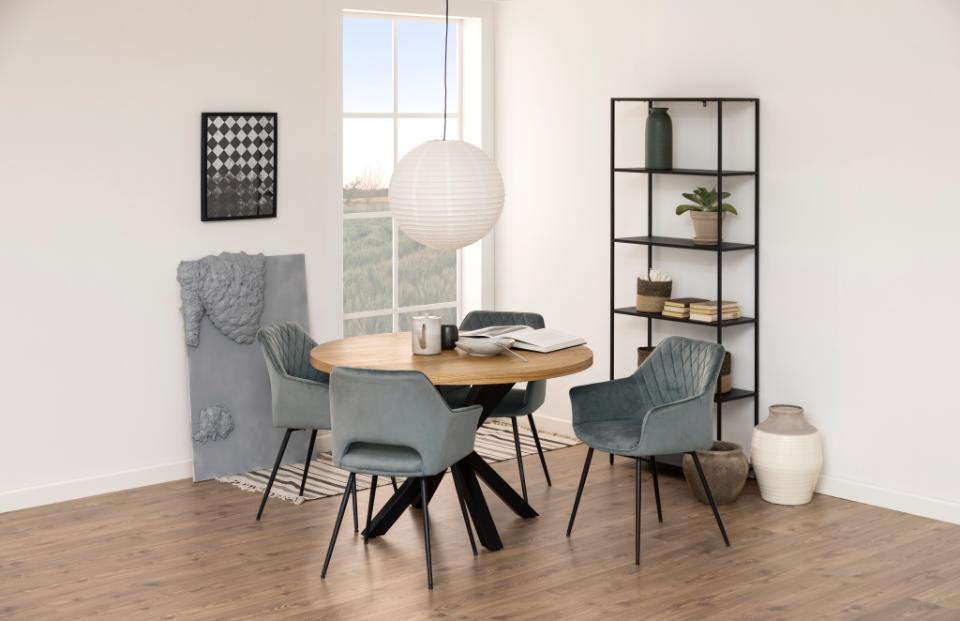 Modern dining room with wooden table and gray chairs near a large window.