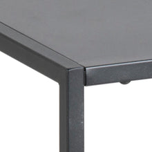 Load image into Gallery viewer, Close-up of a corner of a black metal table with a white background
