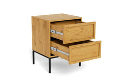 Load image into Gallery viewer, A light oak wood nightstand with two pull-out drawers, supported by slim black metal legs, shown on a white background.
