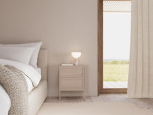 Load image into Gallery viewer, Modern bedroom with a bed, nightstand, and large window.
