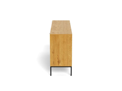 Side view of a wooden sideboard with a light finish on a white background