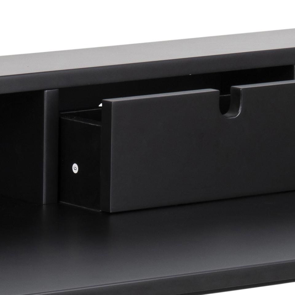 Close-up of a black drawer with a pull handle cutout, set inside a matching black furniture piece.