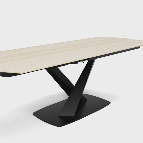 Video of the extending Morella beige ceramic dining table on a white background