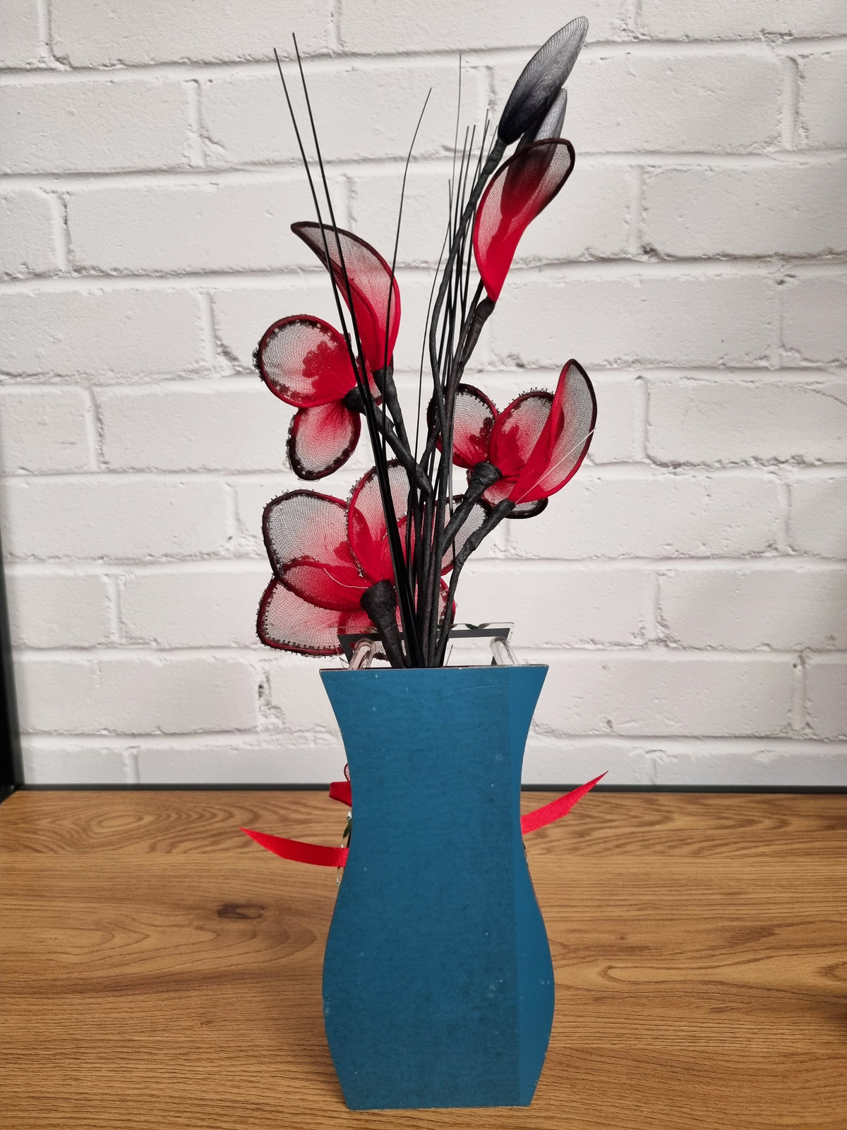 Gossamer Nylon Flower In A Mirrored Vase With Stunning Detail